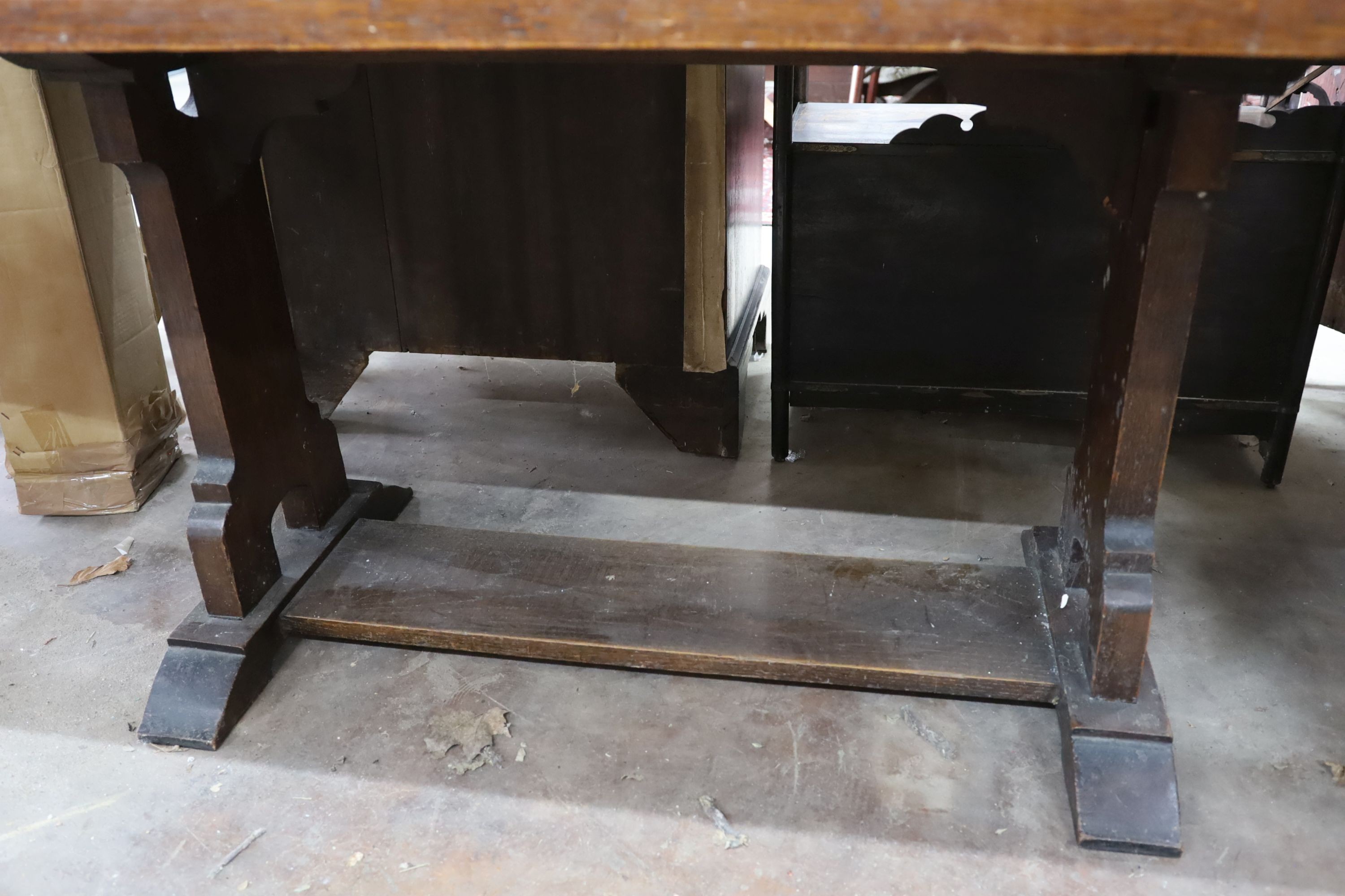 A rectangular oak cleated planked top refectory dining table, length 165cm, depth 91cm, height 76cm